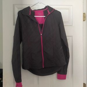 Champion running jacket. Gray with pink accent. Great condition. Size small